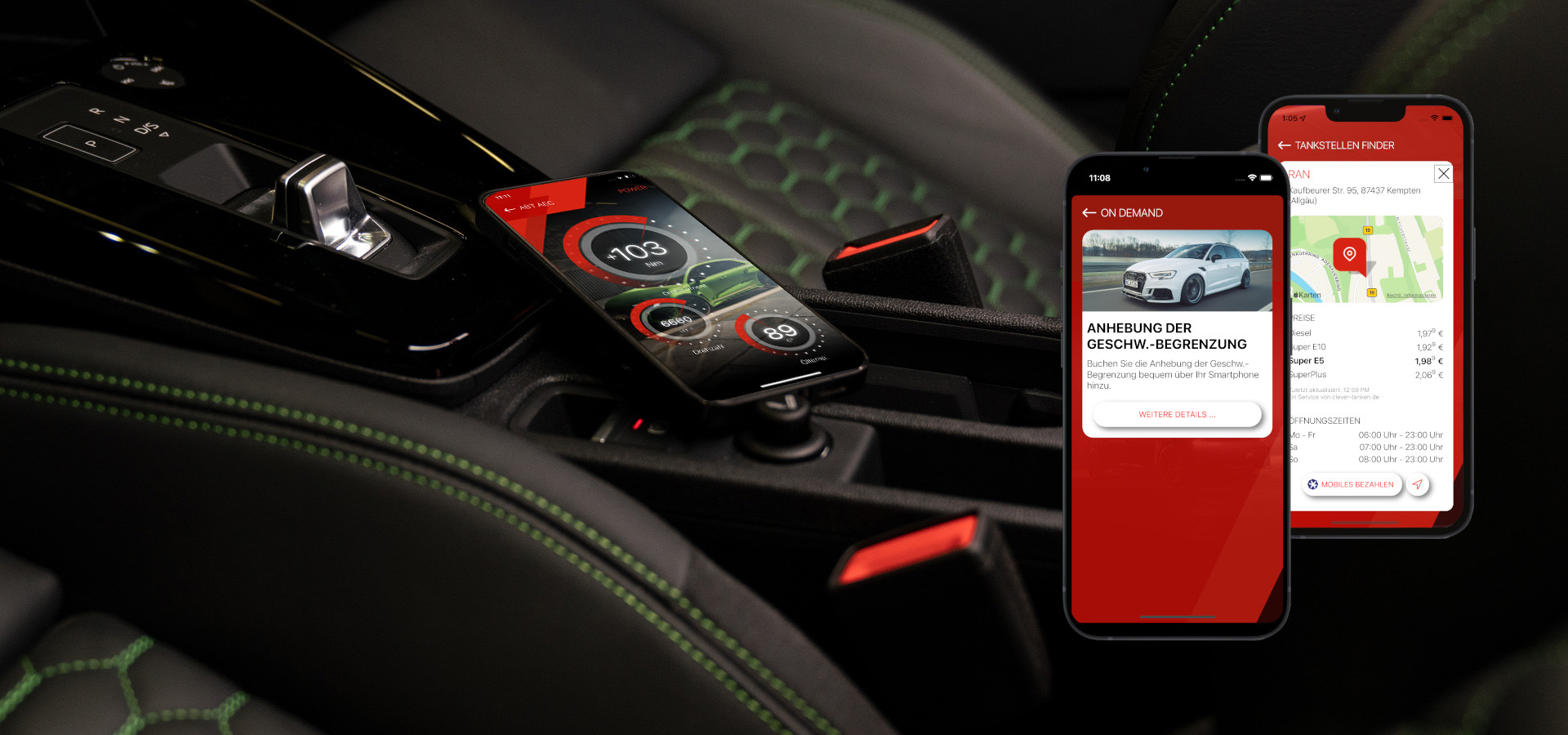 Close-up of centre console with mobile phone and ABT app